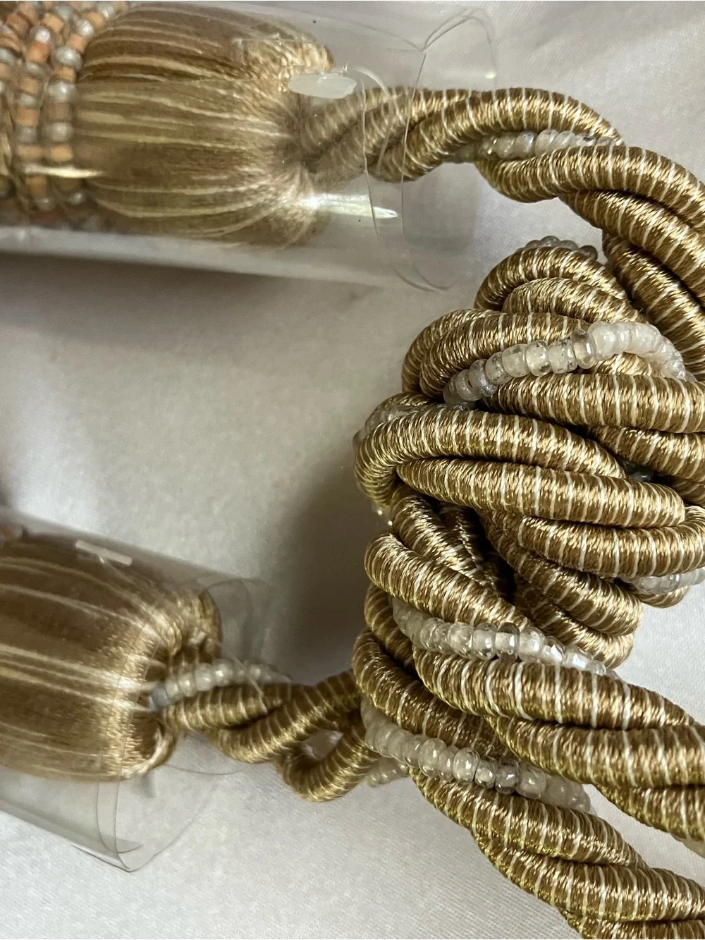 Drapery tie backs with pearl beading